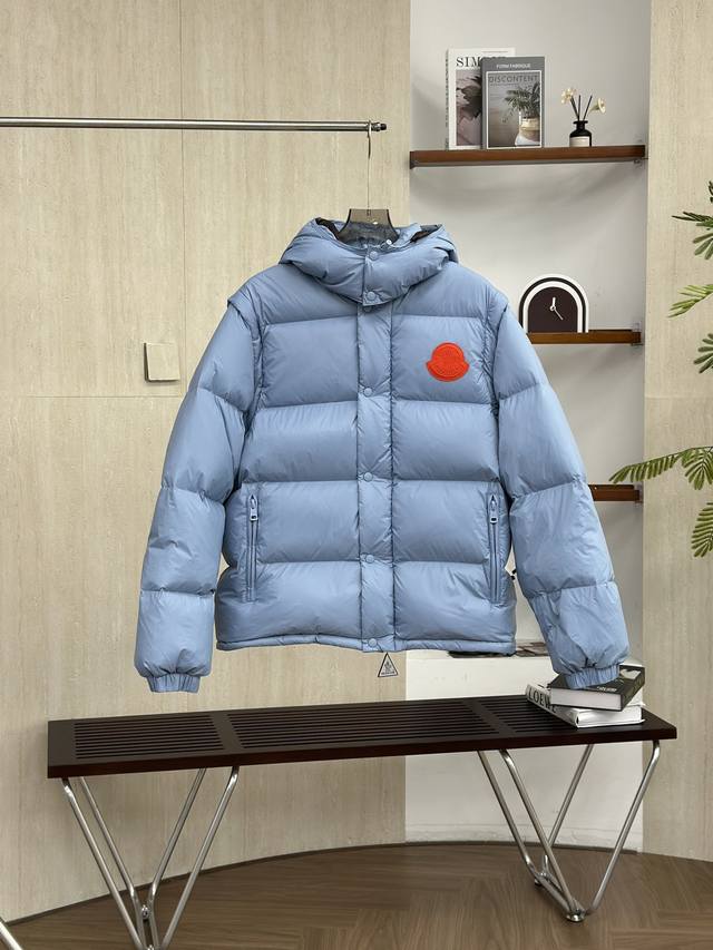 Moncler 2-in-1 Hooded Down Jacket with Detachable Sleeves. Filled with 90% white