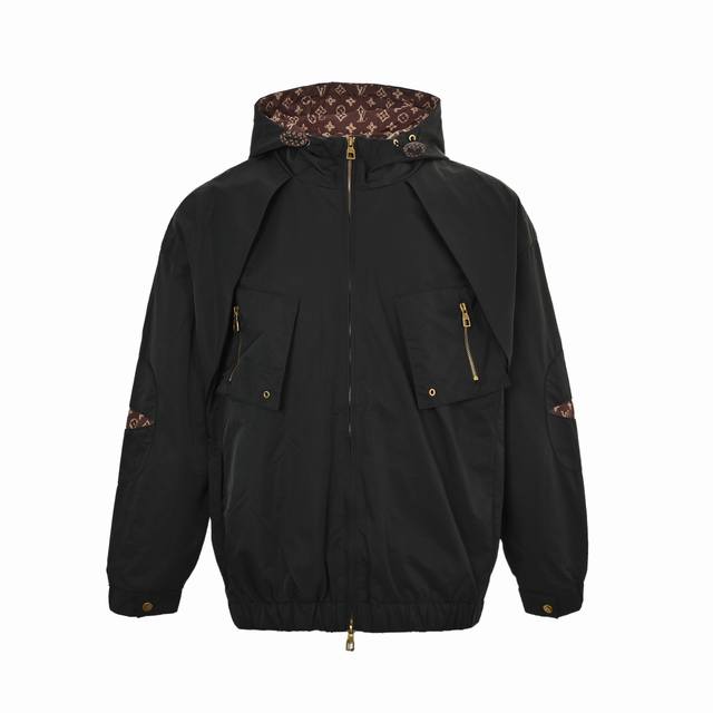 Louis Vuitton monogram print all-over patchwork trench coat with zip-up closure.