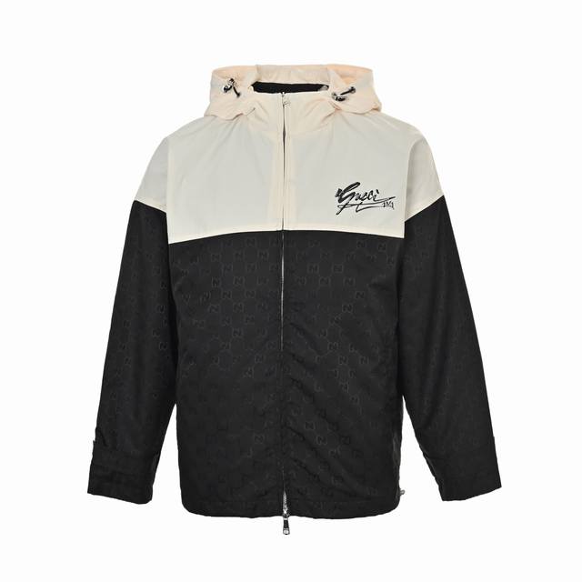 Gucci jacquard patchwork hooded trench coat. Made with black and white fabric pa