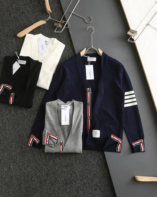 Authentic Thom Browne 4-stripe wool cardigan, sold simultaneously with official
