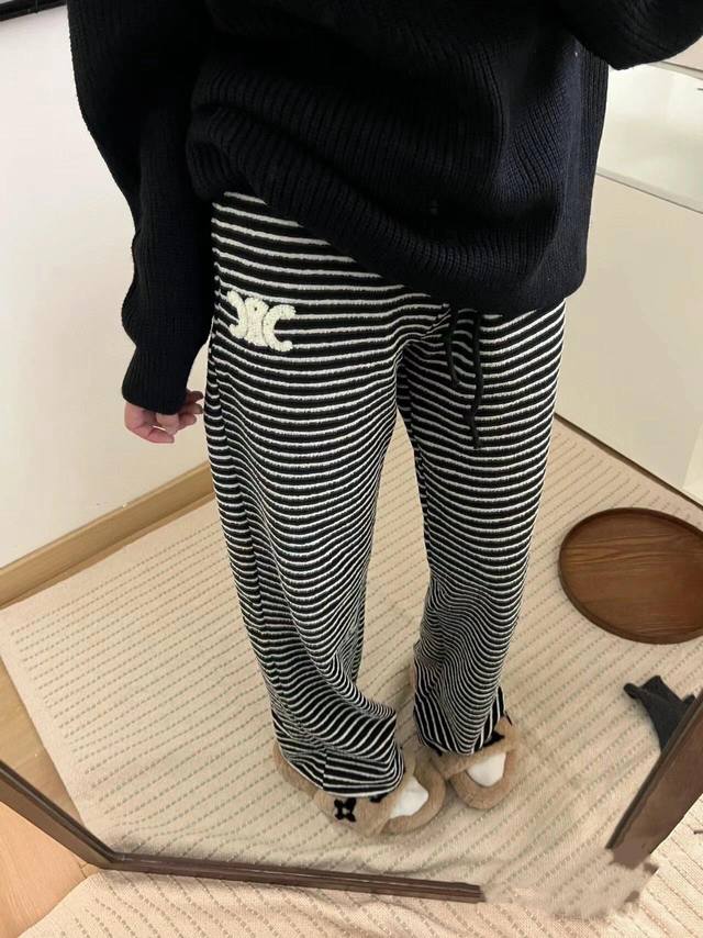High-end fleece-lined Celine Arc de Triomphe striped wide-leg pants. The fit is