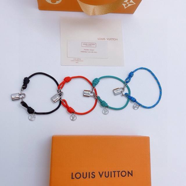 Special offer: Only green and blue Louis Vuitton love lock bracelets available.