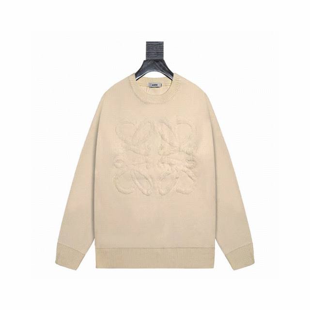 Loewe, a crew neck knit sweater from its iconic Anagram collection. Loewe is a S