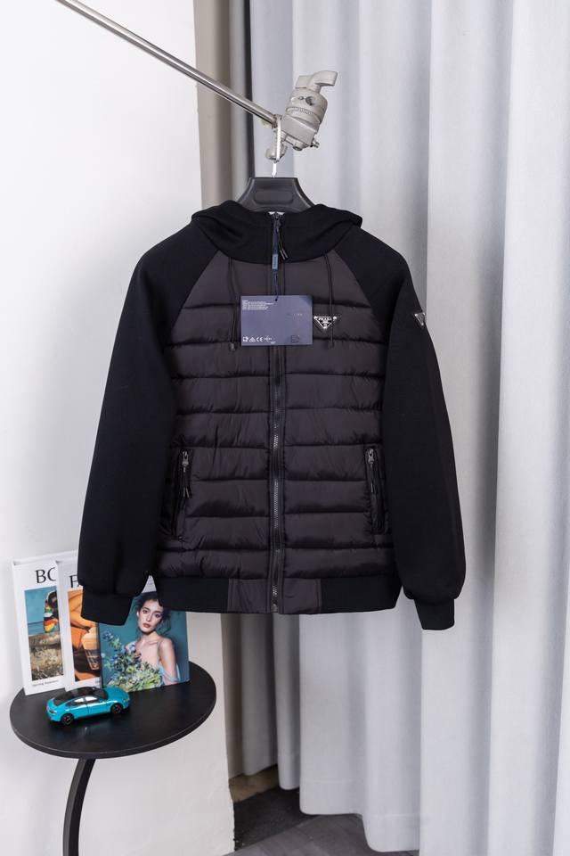 Style No. S033 Prada's classic triangular logo is prominently displayed on the c