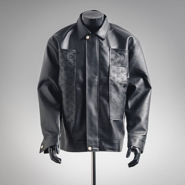 Louis Vuitton Lv 25Ss Pocket Patchwork Logo Embossed Leather Jacket. This is a c