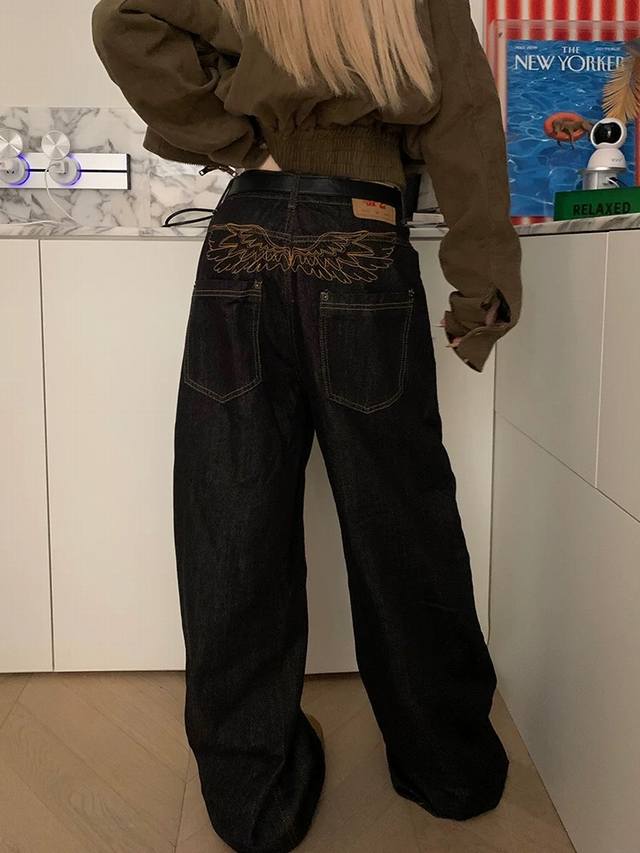 Style No. Xk3624 American Retro Embroidered Wings Black Jeans for Men and Women.