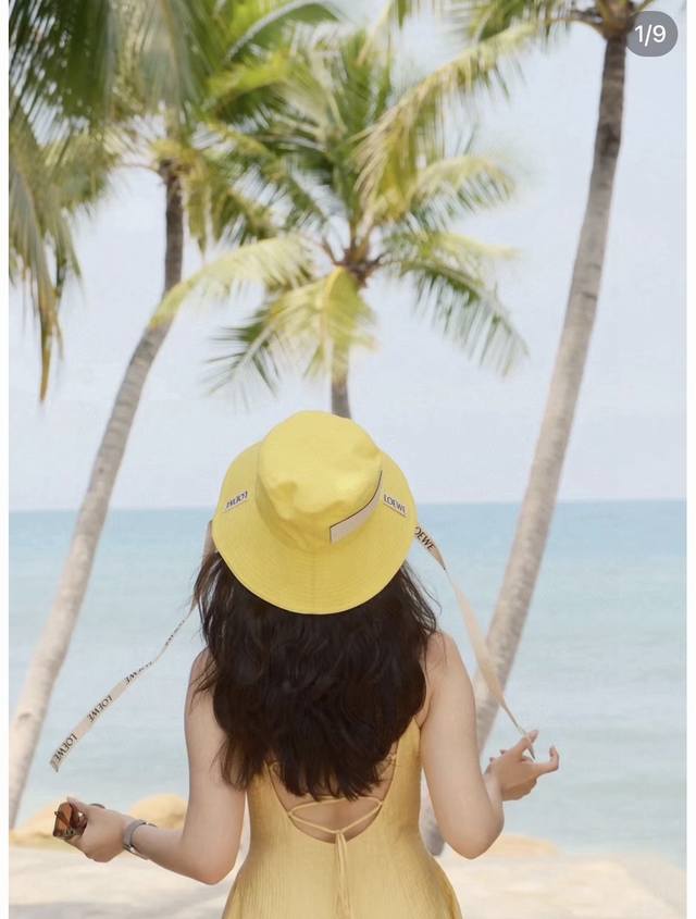 Comes with dust bag. Loewe's unique bucket hat with a strap; extremely hard to f Comes with dust bag. Loewe's unique bucket hat with a strap; extremely hard to f