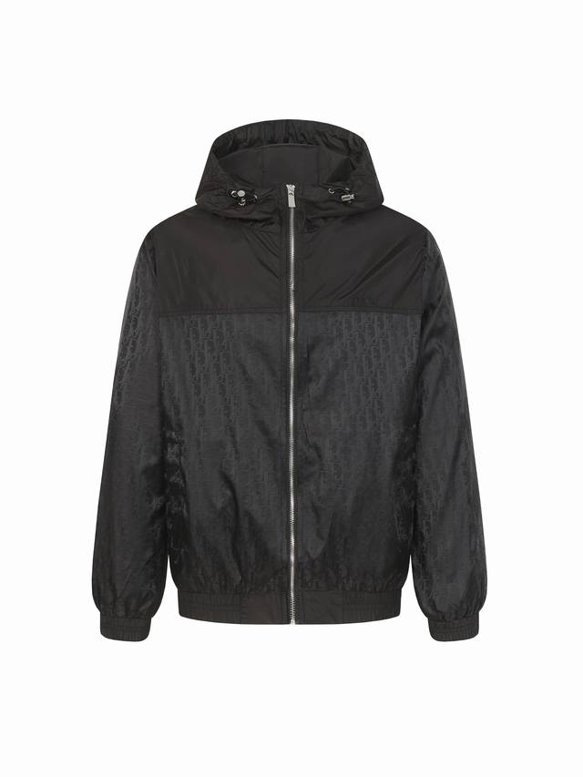 Dior logo all-over print hooded jacket. Rarely available through trade channels,