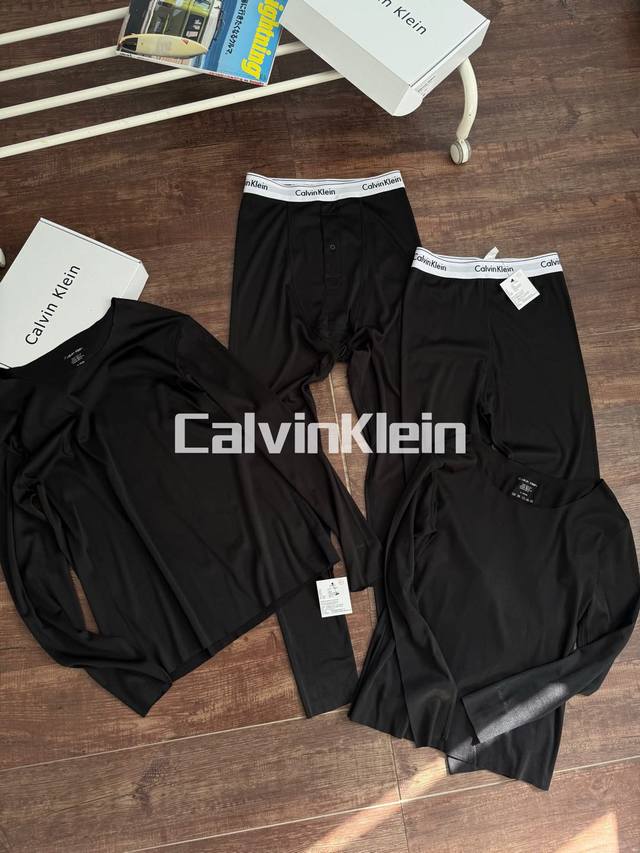 Available for purchase. Colors: Men's black suit, Women's black suit. Sizes: Men