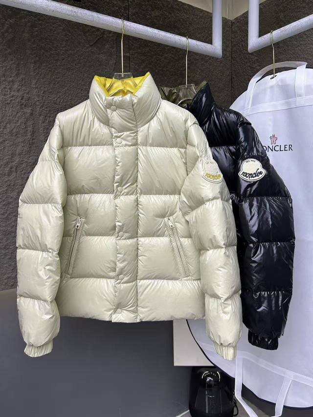 Moncler Triti Down Jacket, unisex style, featuring a large logo and design (1952
