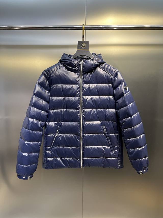 Prada Hooded Embossed Shoulder Padded Down Lightweight Jacket This down jacket f