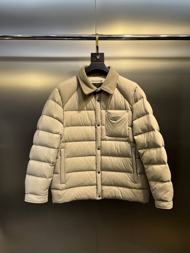Prada New Jacquard Nylon Down Jacket with Metal Logo. This down jacket is made f