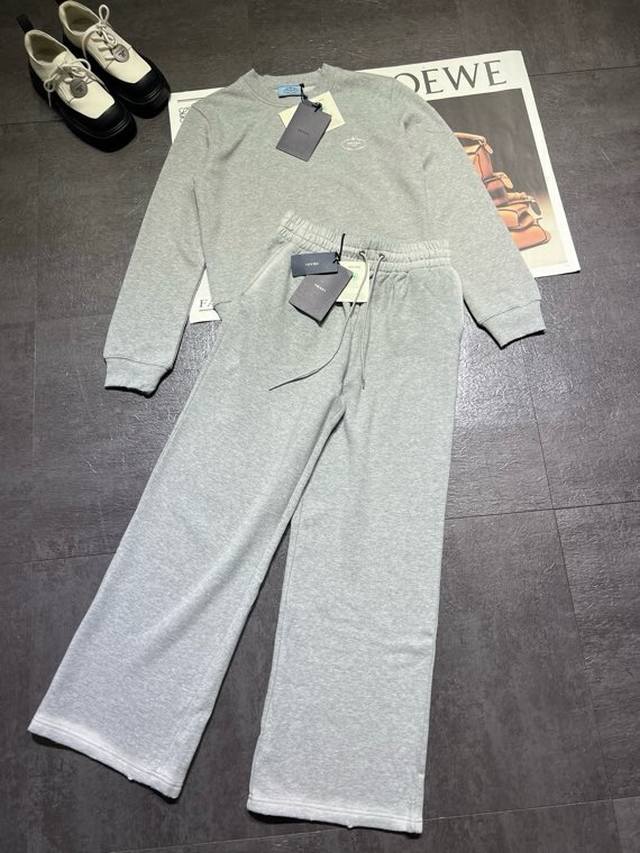 Original Prada casual suit, featuring exquisite embroidery. Note that the pants