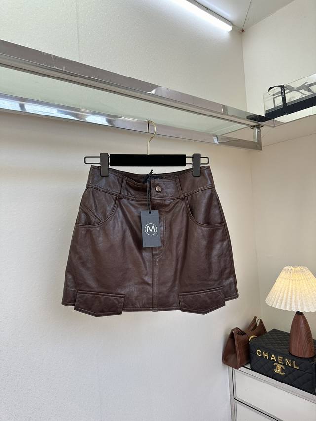 25 D This versatile piece feels like a must-have for all seasons. Made of import