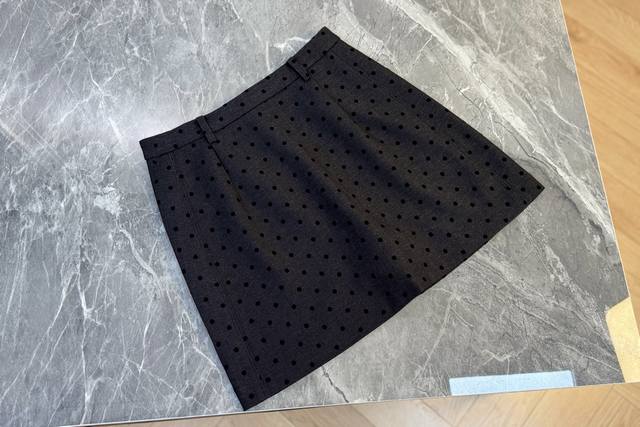 25 New Polka Dot Mini Skirt - Classic black base covered in small polka dots, re