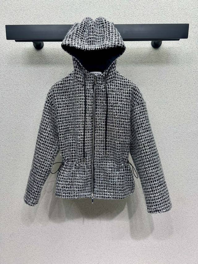 A Chanel-inspired chunky knit hooded jacket that's stylish, understated, elegant