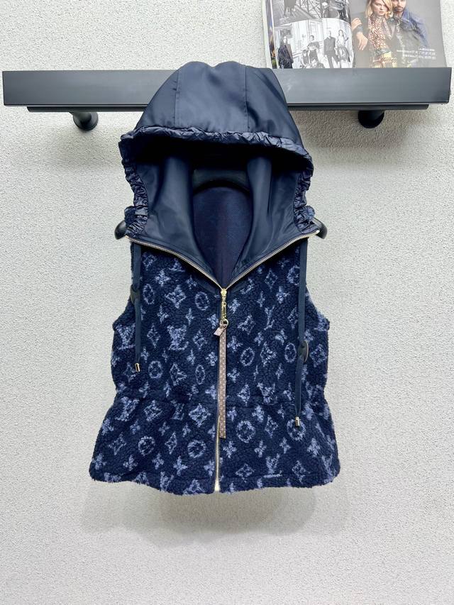 L's monogrammed eco-friendly lamb wool hooded vest is a must-have for fashionist