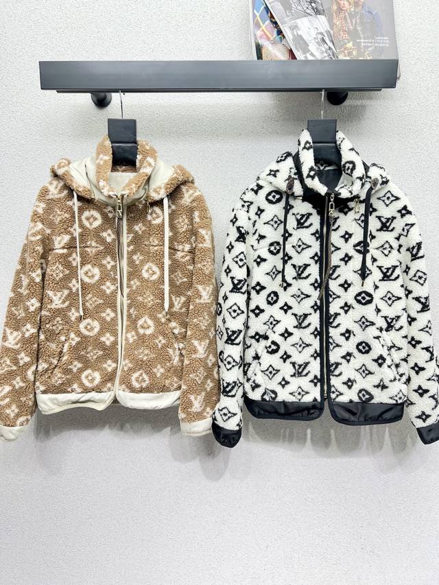 L's monogrammed eco-friendly lamb wool hooded jacket is a must-have for fashioni