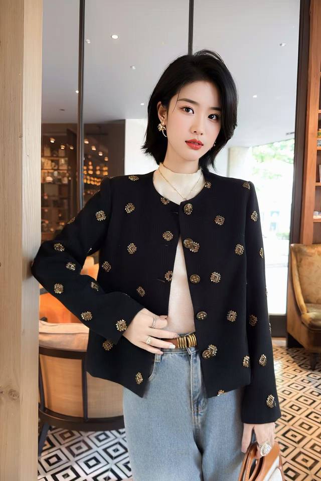 Jacket Ddd: A brown short jacket adorned with gold geometric beads and a retro b