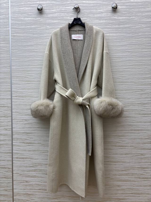 V-neck cashmere coat with a soft beige woven plaid trim and plush cuffs adding a
