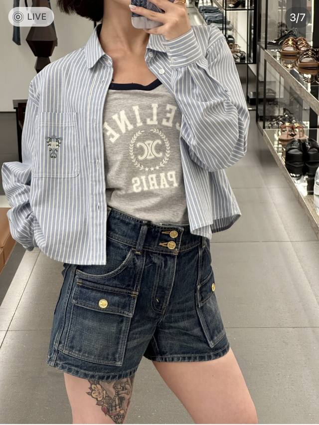 Celine's new floral embroidered striped shirt looks absolutely stunning! The emb