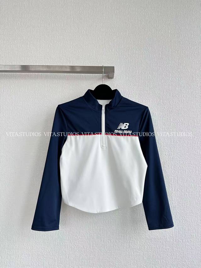 Hot Selling In Stock Color Block Half-Zip Top Made of a polyester and spandex bl