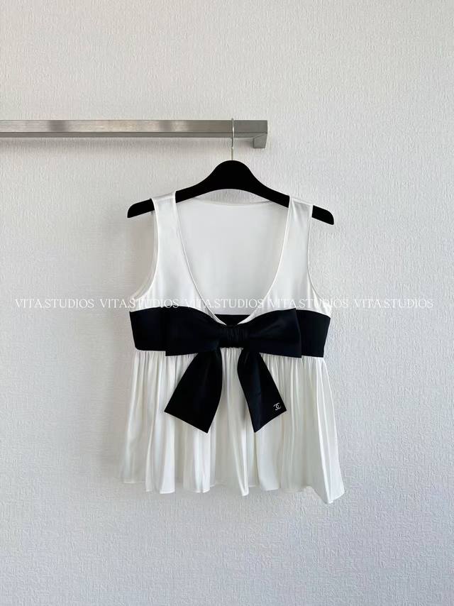 Hot Selling Item, Limited Stock Available. This bow-tie top is made of 100% silk