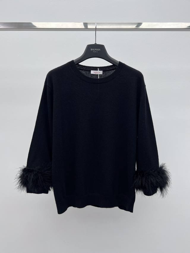 Valentin Feather Sleeve Knit Top (Ddd) Made from 100% wool knit fabric. Features