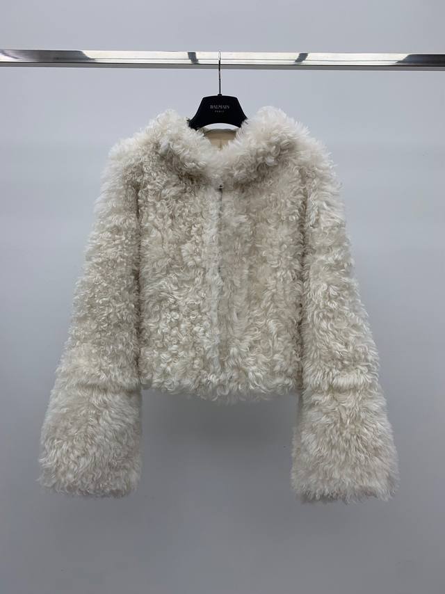 Hooded Shearling Coat Made with premium imported Tuscan shearling fabric. The fu Hooded Shearling Coat Made with premium imported Tuscan shearling fabric. The fu