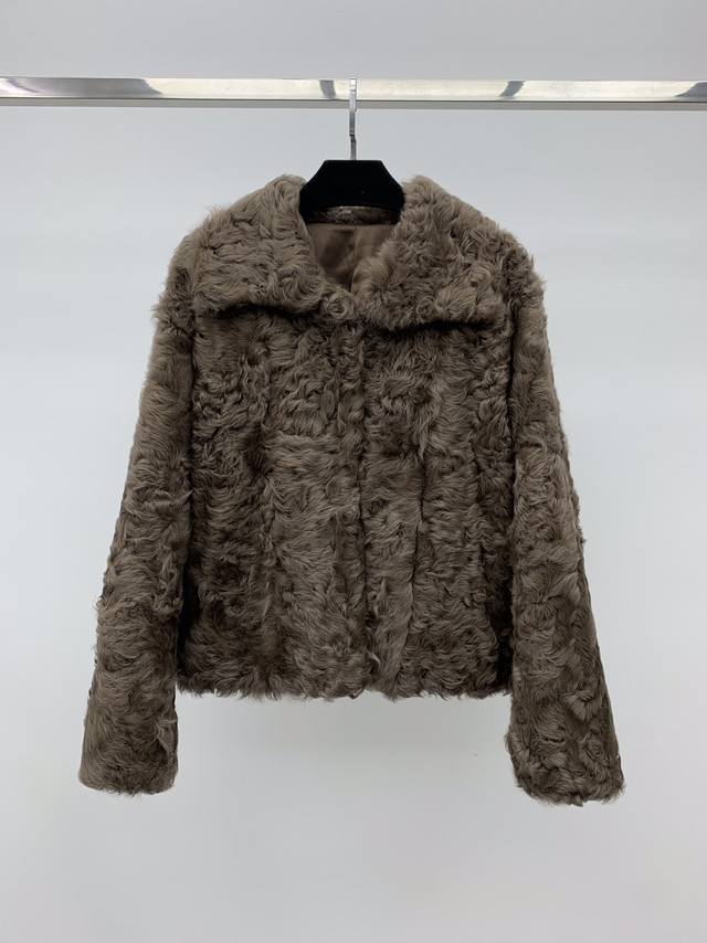 Shearling Coat with Lapel Collar Made with imported Tuscan shearling, this coat Shearling Coat with Lapel Collar Made with imported Tuscan shearling, this coat