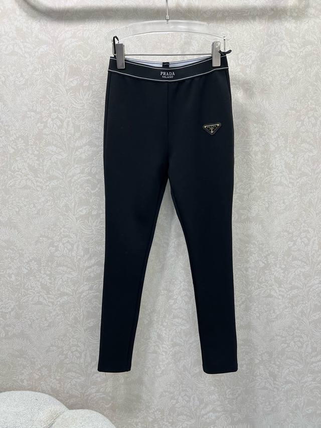 Prad*25 New Tight Leggings/Shark Pants. The contrasting lettering on the waistba