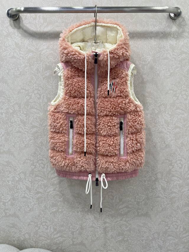 Moncle*25 New Ski Series Faux Lambswool Down Vest. Made with custom-made eco-fri