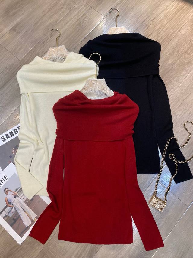 Off-the-shoulder wool sweater. Made of soft and stretchy Merino wool, the off-th