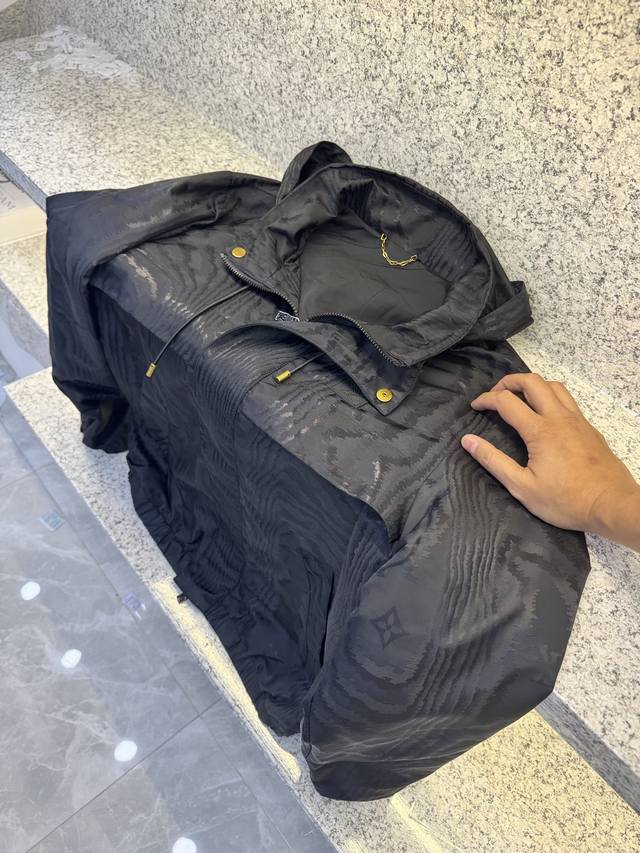 LV Men's Hooded Jacket, a popular style from the official website, is a fashiona