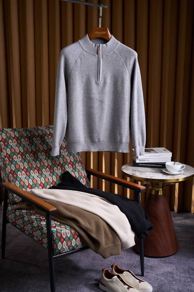 Leather Half-Zip Knit Sweater, made with 34.6% wool jacquard rib knit, raglan sl