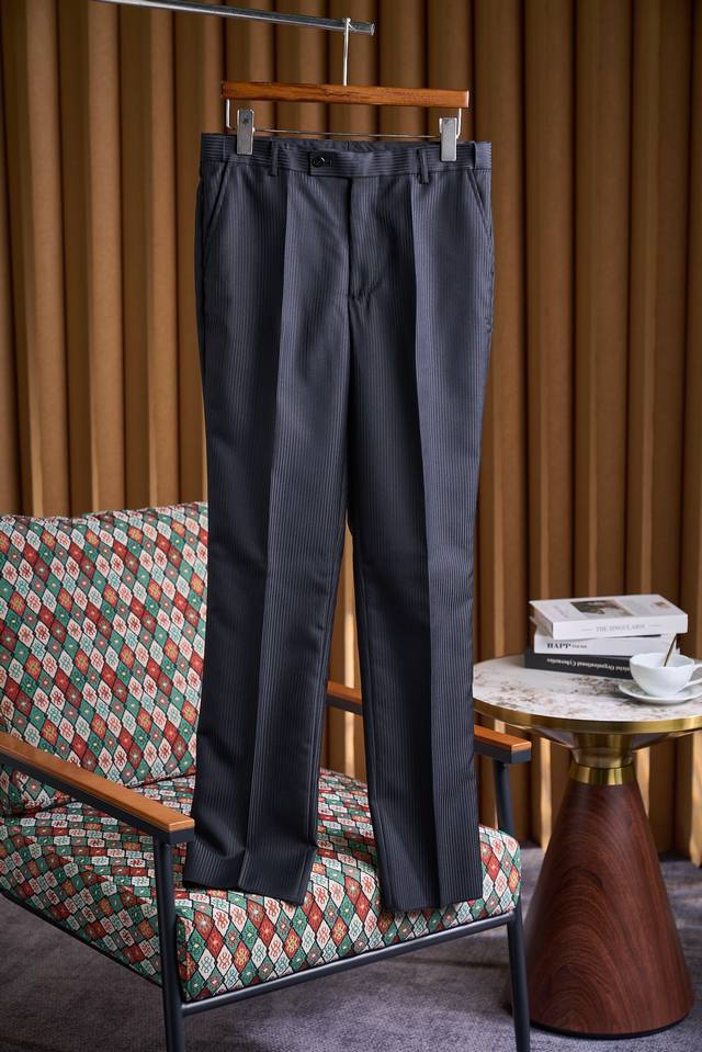 Celebrity Choice! Elegant, understated, and sophisticated, this black striped su