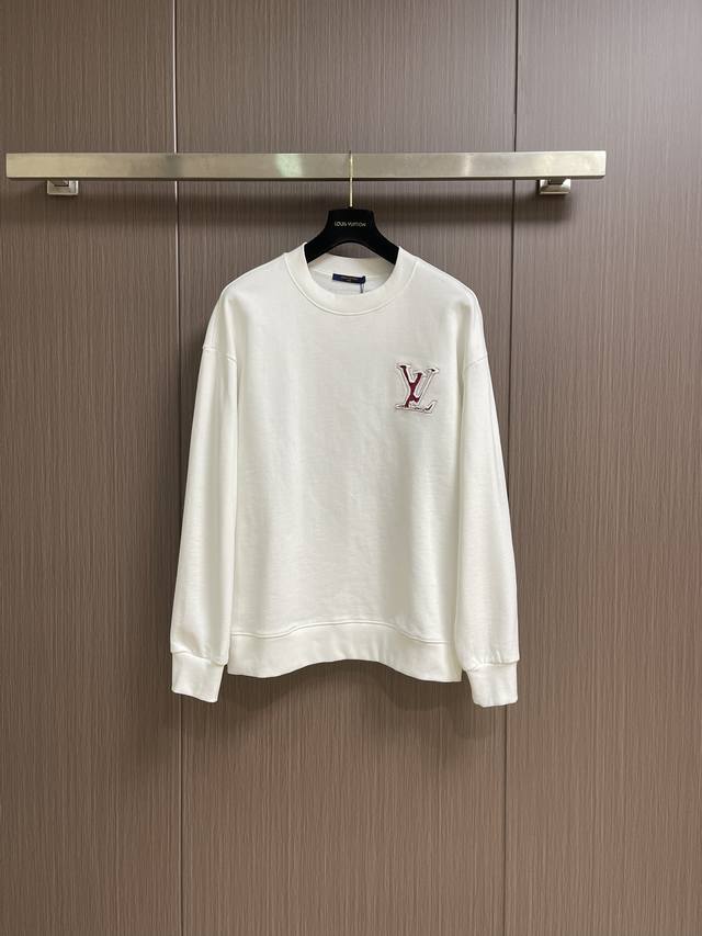 Lv This crew neck sweatshirt features hand-cut burnout appliqu