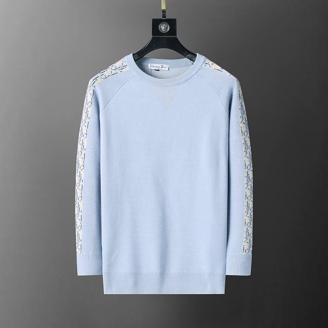 New winter round neck pullover sweater with Cd letter jacquard sleeves. Stylish,