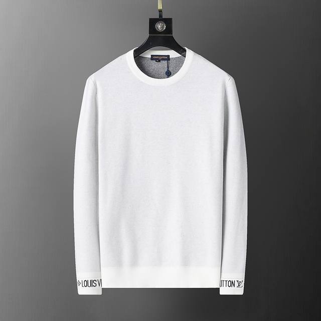 New winter round neck pullover sweater with letter jacquard cuffs. Simple, styli
