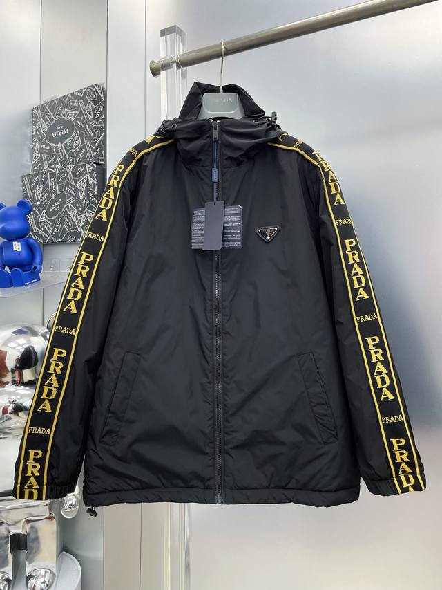 Pra* New Prada Logo Webbing Patchwork Down Jacket S This jacket is touted as a p