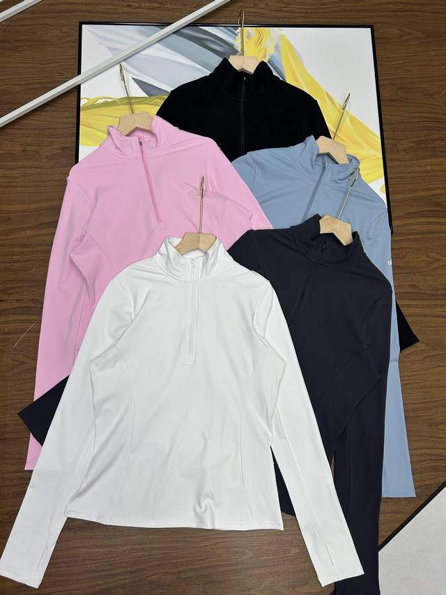 Alo Women's Half-Zip Base Layer Yoga Tee is also a best-selling item that sells