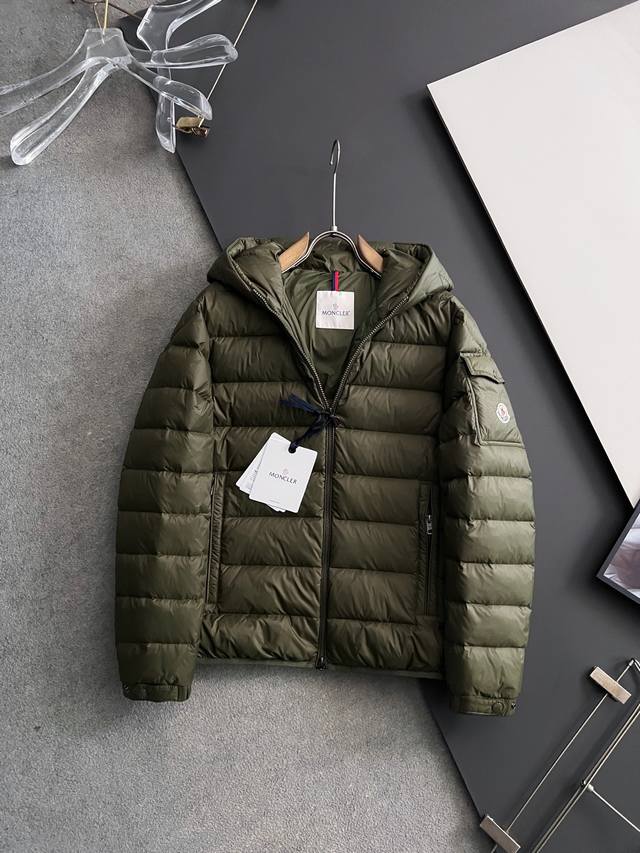 Moncle*25 New Down Jacket: This short down jacket features a soft, wrap-around s