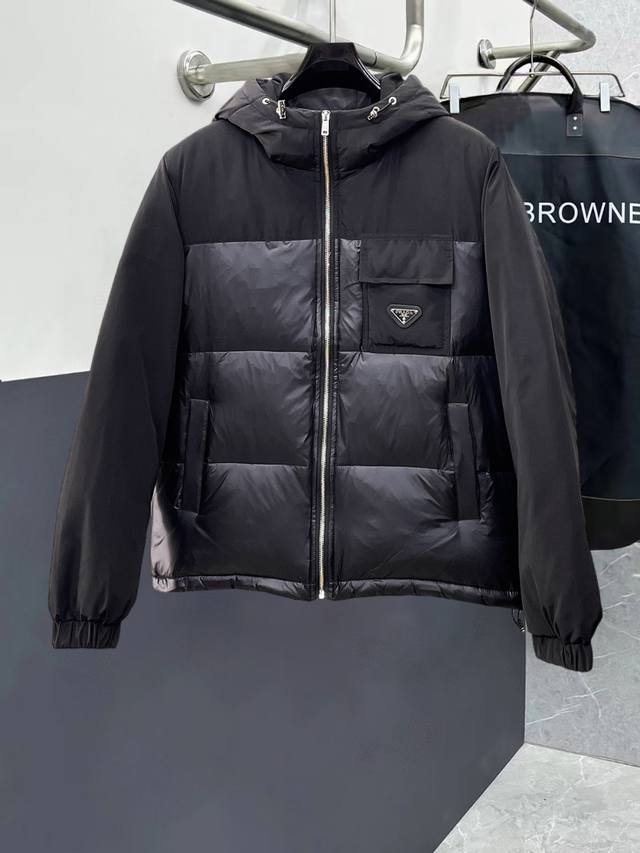 Prada's newest down jacket from their official website. This jacket, touted as