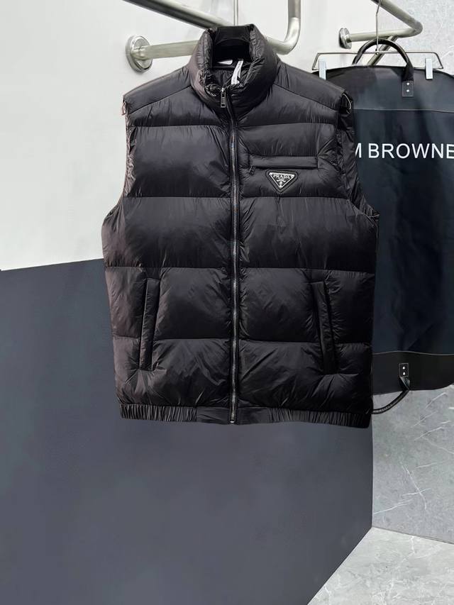 Prada new down-filled cotton-padded jacket with all three labels intact. A runw