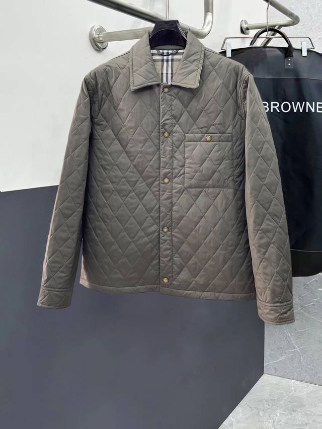 Burberry new down-filled cotton-padded jacket with all three labels intact. A r