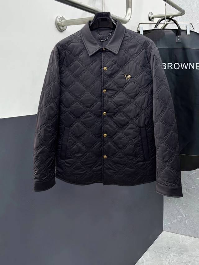 Versace new down-filled cotton-padded jacket with all three labels intact. A ru