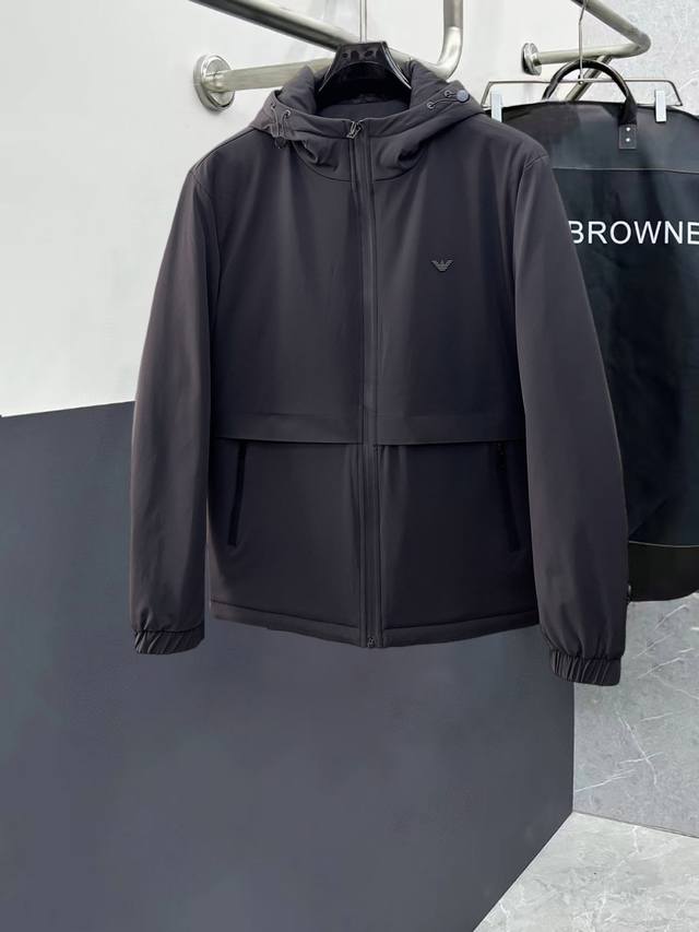 Armani new down-filled cotton-padded jacket with all three tags intact. A runwa