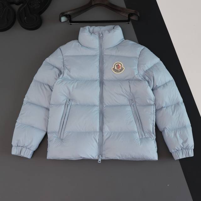 Top-quality Moner down jacket with micro-label patch and stand-up collar. Every