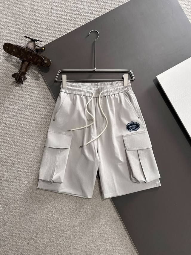 High-end Prada 2025 Summer New Elastic Waist Casual Shorts, Ships the Next Day.