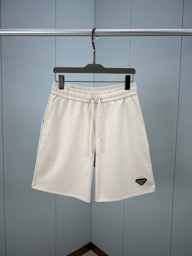 Prada Summer Men's Ice-Oxygen Cotton Casual Shorts. Featuring a classic Prada b